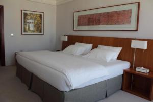 Кровать или кровати в номере K108 Hotel Doha