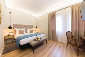 Posteľ alebo postele v izbe v ubytovaní Hotel Real Segovia by Recordis Hotels