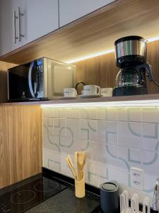 Una cocina o cocineta en Modern studio, with Alexa automation