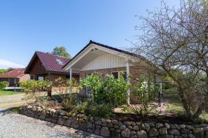Zahrada ubytování Feriendorf Südstrand Haus 7