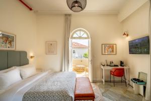 Voodi või voodid majutusasutuse THE GUTMAN TLV - Neve Tzedek toas
