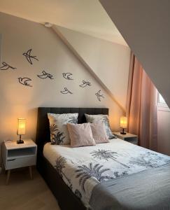 Ένα ή περισσότερα κρεβάτια σε δωμάτιο στο Appartement Strasbourg Centre