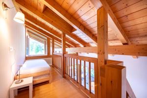 En eller flere senge i et værelse på Haus am Leitenfeld