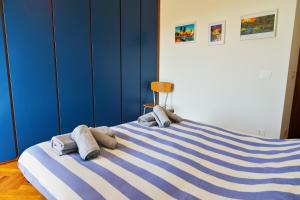 Postel nebo postele na pokoji v ubytování Casa Giorgi + 24 fotografií