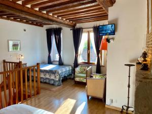 Posteľ alebo postele v izbe v ubytovaní Le Douet Fleury - Chambre d'Hôtes et Gîtes