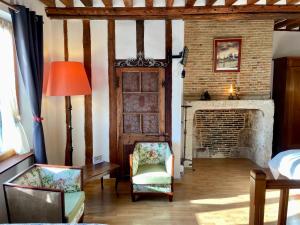 Posedenie v ubytovaní Le Douet Fleury - Chambre d'Hôtes et Gîtes
