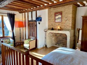 Posteľ alebo postele v izbe v ubytovaní Le Douet Fleury - Chambre d'Hôtes et Gîtes