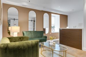 a living room with a couch and a table at The SFX Old Port in Montreal +178 photos