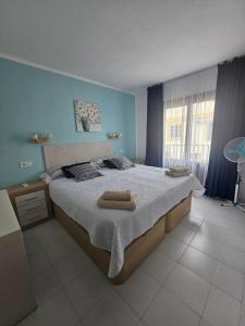 Un pat sau paturi într-o cameră la Apartamento Costa Azul VERA +30 fotografii