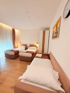 Postel nebo postele na pokoji v ubytování Bala Dream House