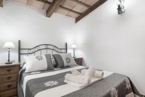 Apartamentos el Cortijo房間的床 +94 張相片