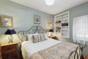 Ένα ή περισσότερα κρεβάτια σε δωμάτιο στο Barrio Casita 1