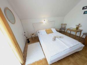 Postel nebo postele na pokoji v ubytování Apartments in Zalakaros 35286