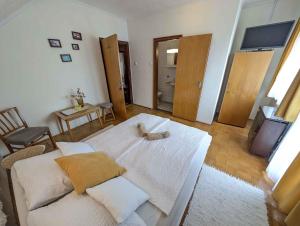 Postel nebo postele na pokoji v ubytování Apartments in Zalakaros 35286