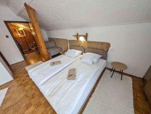 Postel nebo postele na pokoji v ubytování Apartments in Zalakaros 35286
