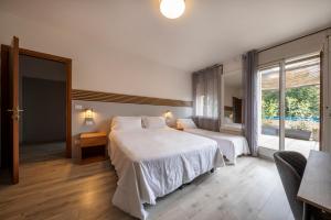 Postel nebo postele na pokoji v ubytování Bed & Bike Feltre