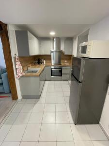 Η κουζίνα ή μικρή κουζίνα στο Le 1470 Appart 4 personnes Sélestat centre historique Alsace centrale