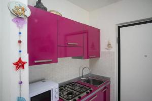 A kitchen or kitchenette at M247 - Marcelli, nuovo bilocale con terrazzo e garage