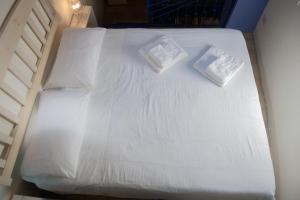 Postel nebo postele na pokoji v ubytování B&B Dimora Cigno