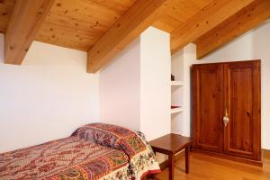 Postel nebo postele na pokoji v ubytování Residence Chalet Provenzale