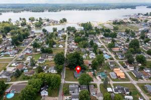 an aerial view of a town next to the water at Buckeye Lake Cottage in Buckeye Lake