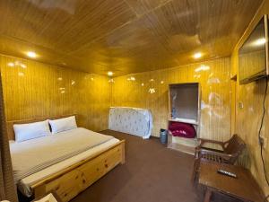 Postel nebo postele na pokoji v ubytování Badakshan Hotel