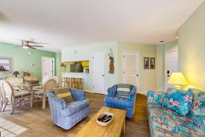 a living room with a couch and chairs and a table at Sea Colony --- 16004 Bayberry Court in Bethany Beach