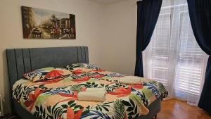 Postel nebo postele na pokoji v ubytování Apartments Gabriela