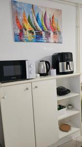 Kuchyň nebo kuchyňský kout v ubytování Apartments Gabriela