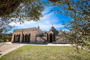 Kép trullo degli ulivi con piscina e vasca per bambini szállásáról San Michele Salentinóban a galériában