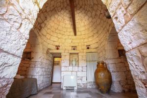 Kép trullo degli ulivi con piscina e vasca per bambini szállásáról San Michele Salentinóban a galériában