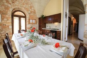 Kép trullo degli ulivi con piscina e vasca per bambini szállásáról San Michele Salentinóban a galériában
