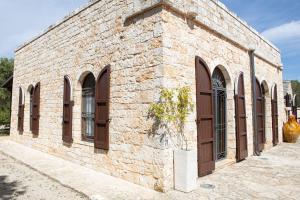 Kép trullo degli ulivi con piscina e vasca per bambini szállásáról San Michele Salentinóban a galériában
