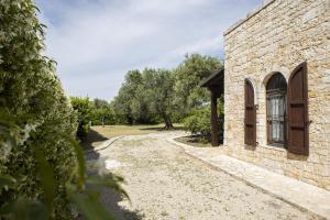Kép trullo degli ulivi con piscina e vasca per bambini szállásáról San Michele Salentinóban a galériában