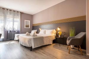 Postel nebo postele na pokoji v ubytování Bed & Bike Feltre