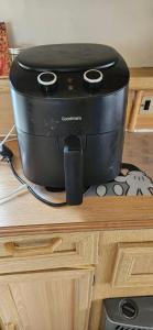 a black slow cooker sitting on top of a counter at Caravan in Leicester