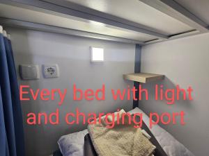 Postel nebo postele na pokoji v ubytování Hostel Renato