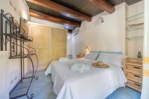 Un pat sau paturi într-o cameră la Villa Rosa