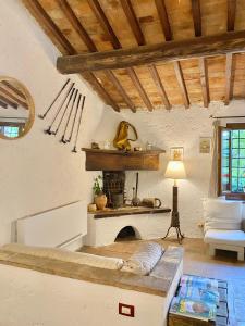 Postel nebo postele na pokoji v ubytování Berenice in Chianti - Authentic Tuscan Country House