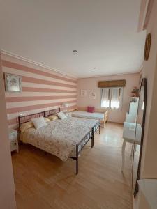 Posteľ alebo postele v izbe v ubytovaní Casa Idalia