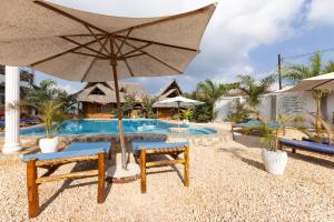 Bazén v ubytování Diacarisma Boutique Resort Nungwi nebo v jeho okolí
