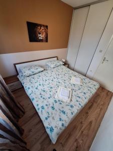 Postel nebo postele na pokoji v ubytování APARTMANI LANA