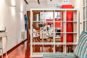 a living room with a table and chairs at Montroig Mar in Sitges
