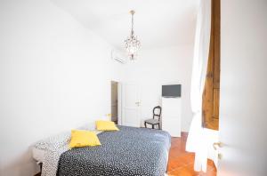 Postel nebo postele na pokoji v ubytování Residenza Moore