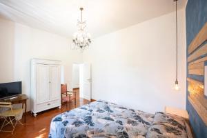 Postel nebo postele na pokoji v ubytování Residenza Moore