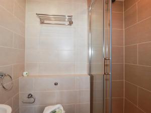 a shower with a glass door in a bathroom at The Beach House in Newquay +33 photos