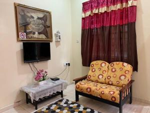 Χώρος καθιστικού στο Faiz Homestay