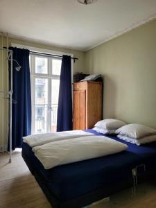 Postel nebo postele na pokoji v ubytování Best location at Vesterbro + 13 fotografií
