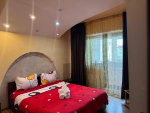 Giường trong phòng chung tại Central Lovely Apartment Craiova