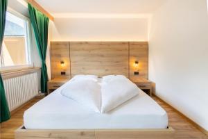 Voodi või voodid majutusasutuse Gasthof Goldenes Lamm toas